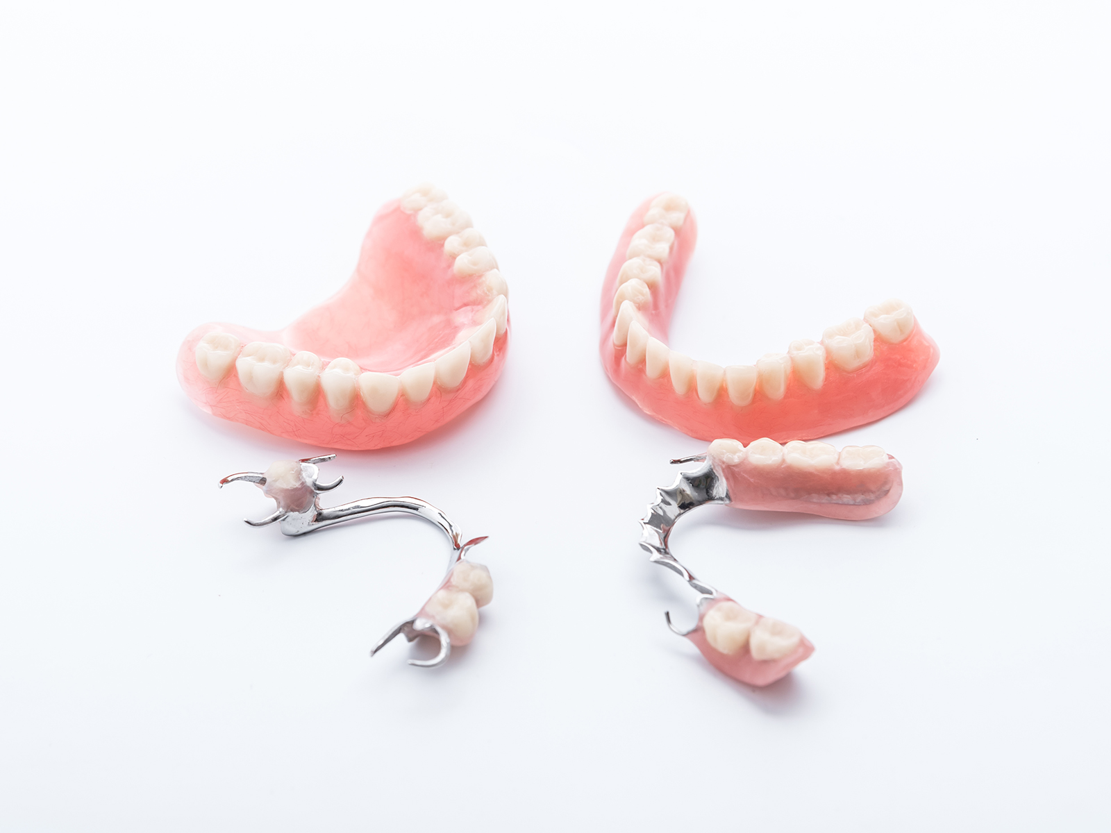 What Is Better Plastic Or Metal Dentures?