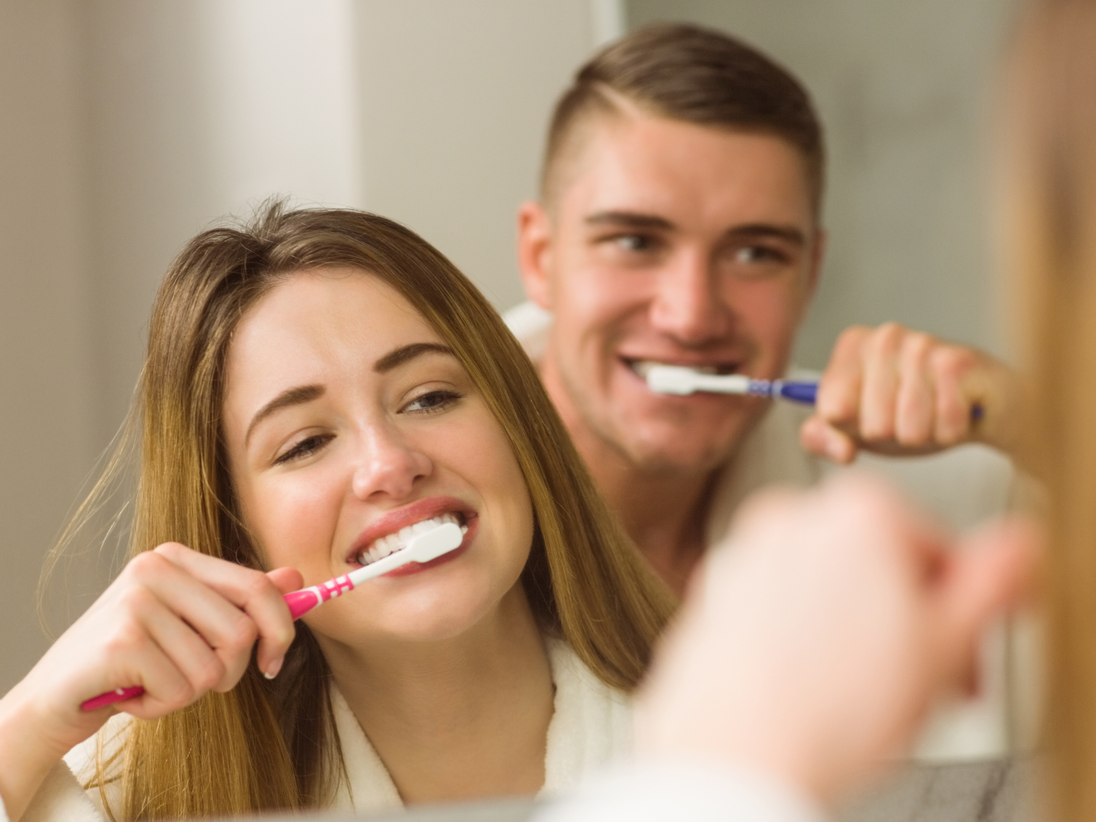 Can you use regular toothpaste with veneers?