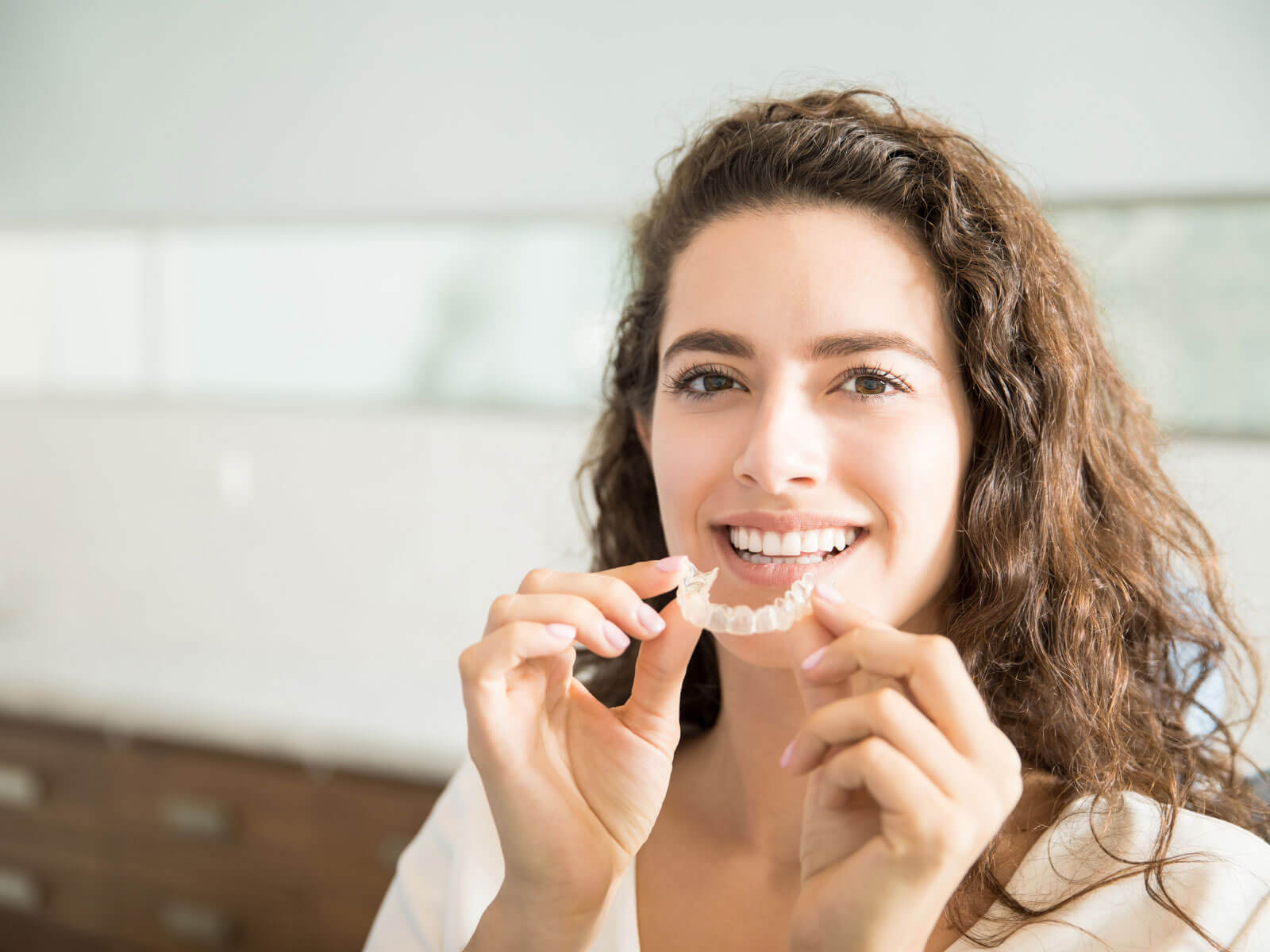 Invisalign for Adults: What to Expect, Cost & Is It Right for You